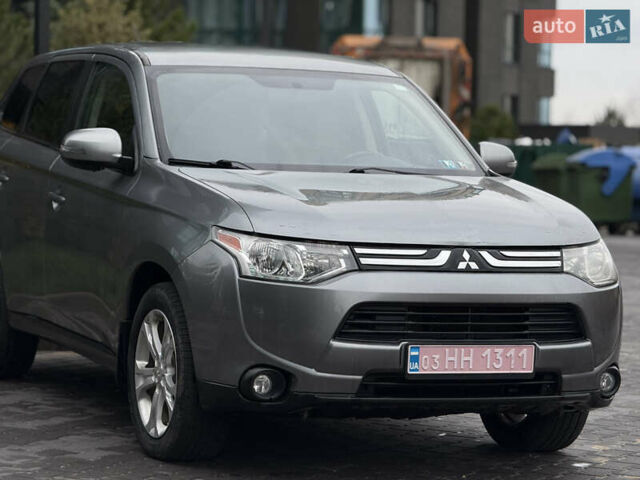 Сірий Міцубісі Аутлендер, об'ємом двигуна 2.4 л та пробігом 190 тис. км за 13000 $, фото 1 на Automoto.ua
