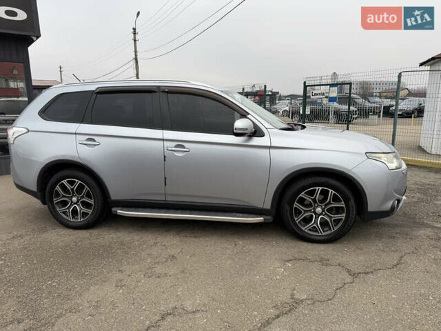 Серый Мицубиси Аутлендер, объемом двигателя 2.36 л и пробегом 198 тыс. км за 13990 $, фото 9 на Automoto.ua