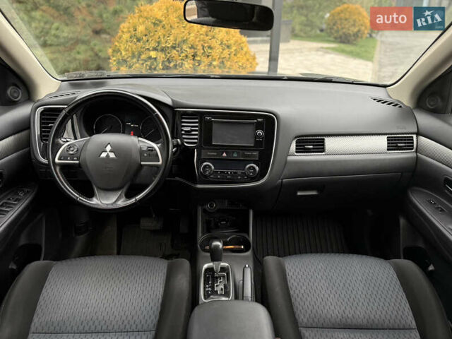 Сірий Міцубісі Аутлендер, об'ємом двигуна 2.4 л та пробігом 190 тис. км за 13000 $, фото 5 на Automoto.ua