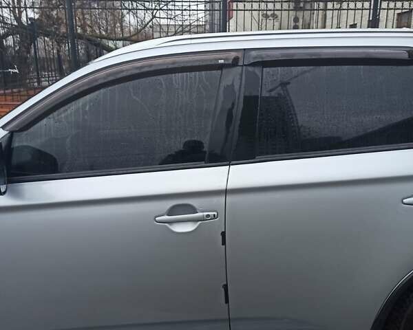 Серый Мицубиси Аутлендер, объемом двигателя 2.4 л и пробегом 197 тыс. км за 14000 $, фото 9 на Automoto.ua