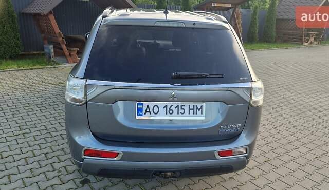 Серый Мицубиси Аутлендер, объемом двигателя 2 л и пробегом 243 тыс. км за 13500 $, фото 8 на Automoto.ua