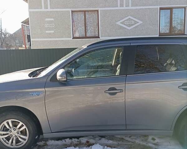 Сірий Міцубісі Аутлендер, об'ємом двигуна 2 л та пробігом 170 тис. км за 15200 $, фото 4 на Automoto.ua