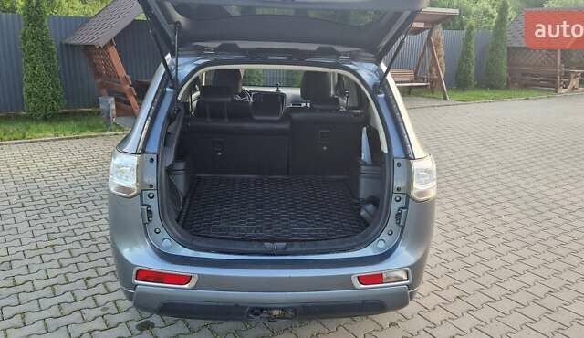 Серый Мицубиси Аутлендер, объемом двигателя 2 л и пробегом 243 тыс. км за 13500 $, фото 5 на Automoto.ua