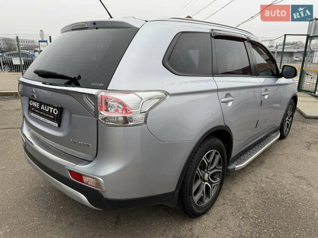 Серый Мицубиси Аутлендер, объемом двигателя 2.36 л и пробегом 198 тыс. км за 13990 $, фото 8 на Automoto.ua