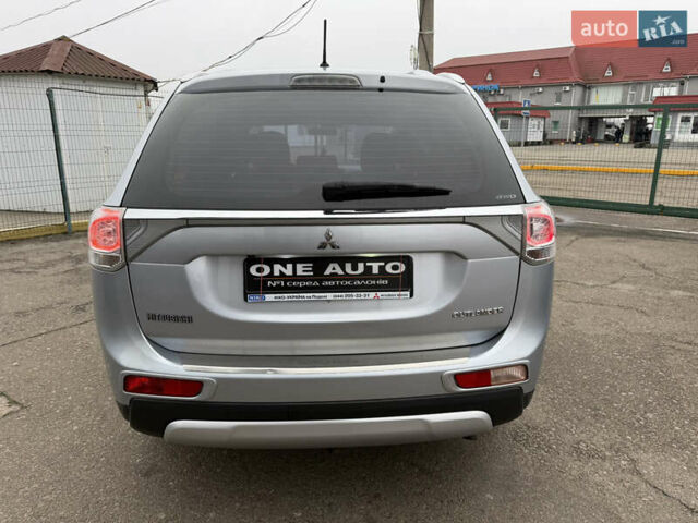 Серый Мицубиси Аутлендер, объемом двигателя 2.36 л и пробегом 198 тыс. км за 13990 $, фото 7 на Automoto.ua