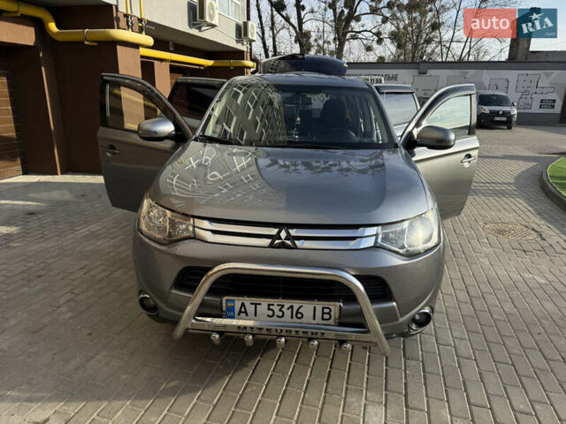 Серый Мицубиси Аутлендер, объемом двигателя 2 л и пробегом 137 тыс. км за 13700 $, фото 14 на Automoto.ua