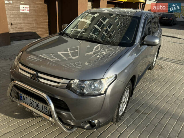 Серый Мицубиси Аутлендер, объемом двигателя 2 л и пробегом 137 тыс. км за 13700 $, фото 11 на Automoto.ua