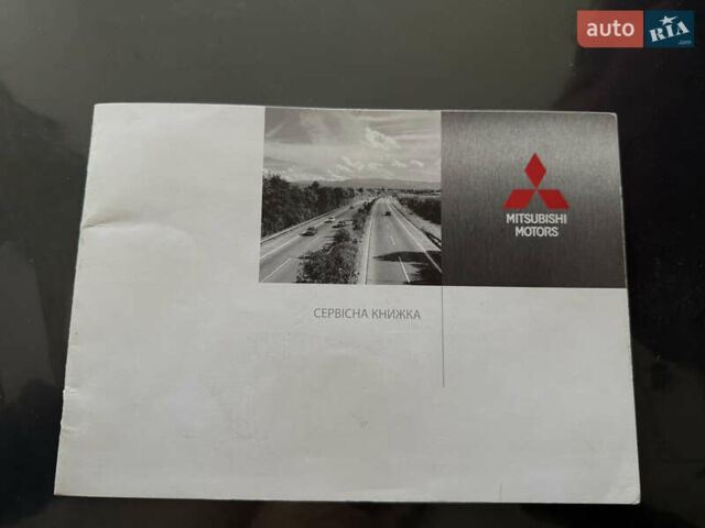 Серый Мицубиси Аутлендер, объемом двигателя 2 л и пробегом 137 тыс. км за 13700 $, фото 18 на Automoto.ua