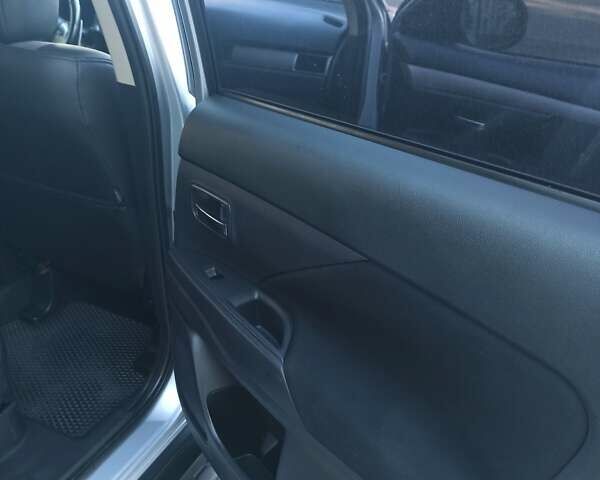 Серый Мицубиси Аутлендер, объемом двигателя 2.4 л и пробегом 197 тыс. км за 14000 $, фото 29 на Automoto.ua