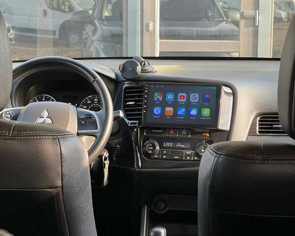 Сірий Міцубісі Аутлендер, об'ємом двигуна 2.4 л та пробігом 209 тис. км за 12200 $, фото 17 на Automoto.ua