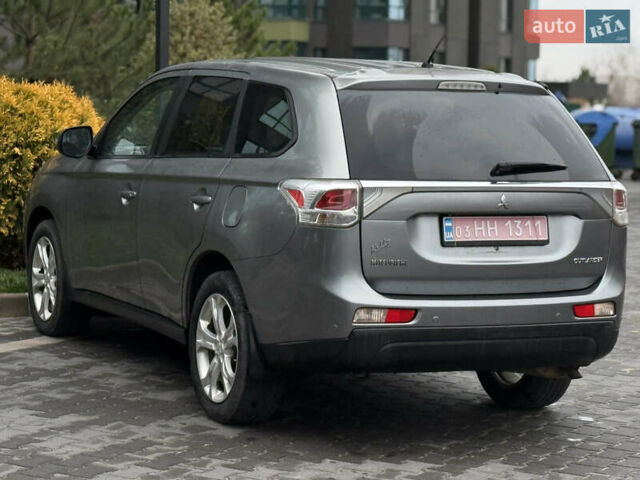 Сірий Міцубісі Аутлендер, об'ємом двигуна 2.4 л та пробігом 190 тис. км за 13000 $, фото 4 на Automoto.ua