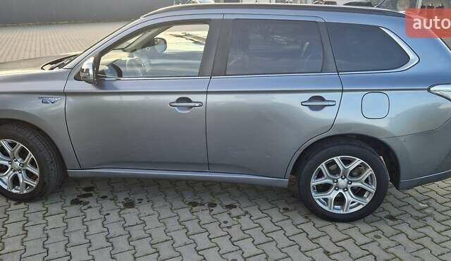 Серый Мицубиси Аутлендер, объемом двигателя 2 л и пробегом 243 тыс. км за 13500 $, фото 6 на Automoto.ua