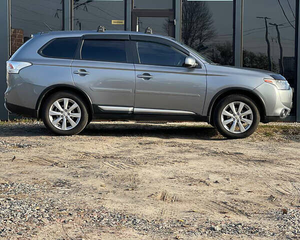 Сірий Міцубісі Аутлендер, об'ємом двигуна 2.4 л та пробігом 209 тис. км за 12200 $, фото 9 на Automoto.ua