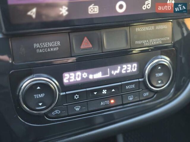 Серый Мицубиси Аутлендер, объемом двигателя 2.36 л и пробегом 164 тыс. км за 17500 $, фото 21 на Automoto.ua