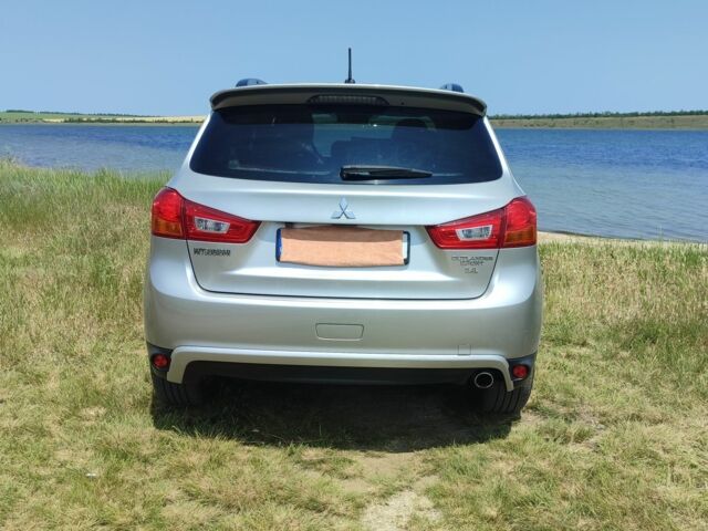 Серый Мицубиси Аутлендер, объемом двигателя 2.4 л и пробегом 132 тыс. км за 12300 $, фото 7 на Automoto.ua