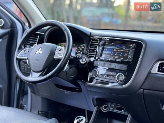 Серый Мицубиси Аутлендер, объемом двигателя 2 л и пробегом 200 тыс. км за 13999 $, фото 40 на Automoto.ua