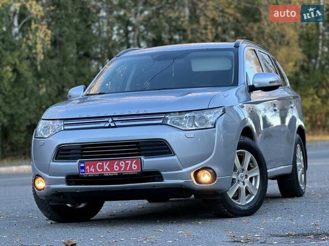 Серый Мицубиси Аутлендер, объемом двигателя 2 л и пробегом 200 тыс. км за 13999 $, фото 12 на Automoto.ua