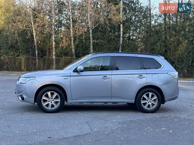 Серый Мицубиси Аутлендер, объемом двигателя 2 л и пробегом 200 тыс. км за 13999 $, фото 14 на Automoto.ua