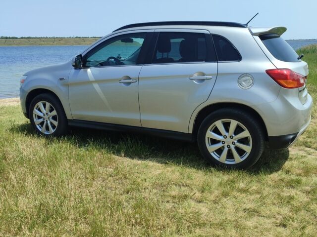 Серый Мицубиси Аутлендер, объемом двигателя 2.4 л и пробегом 132 тыс. км за 12300 $, фото 6 на Automoto.ua