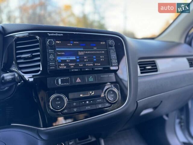 Серый Мицубиси Аутлендер, объемом двигателя 2 л и пробегом 200 тыс. км за 13999 $, фото 34 на Automoto.ua