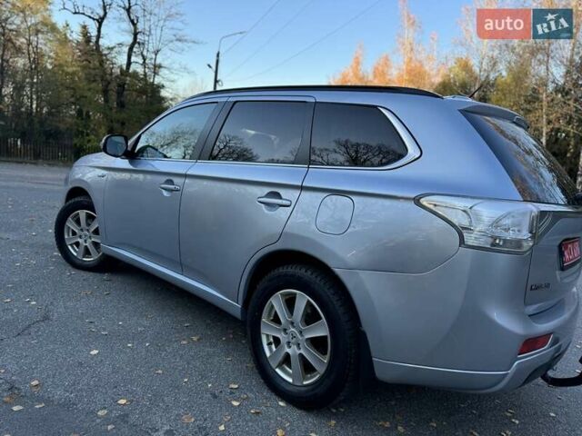 Серый Мицубиси Аутлендер, объемом двигателя 2 л и пробегом 200 тыс. км за 13999 $, фото 19 на Automoto.ua