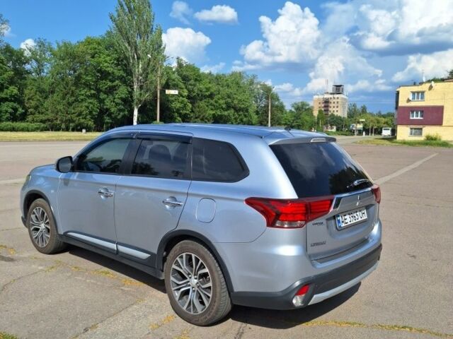 Серый Мицубиси Аутлендер, объемом двигателя 2.4 л и пробегом 160 тыс. км за 14200 $, фото 2 на Automoto.ua