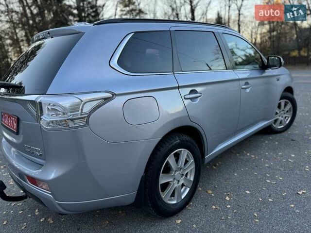 Серый Мицубиси Аутлендер, объемом двигателя 2 л и пробегом 200 тыс. км за 13999 $, фото 26 на Automoto.ua