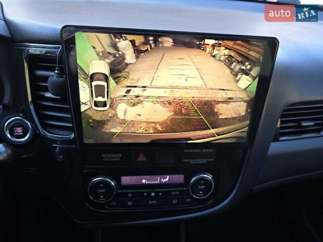 Серый Мицубиси Аутлендер, объемом двигателя 2.36 л и пробегом 164 тыс. км за 17500 $, фото 22 на Automoto.ua