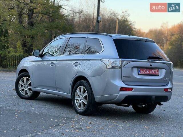 Серый Мицубиси Аутлендер, объемом двигателя 2 л и пробегом 200 тыс. км за 13999 $, фото 21 на Automoto.ua