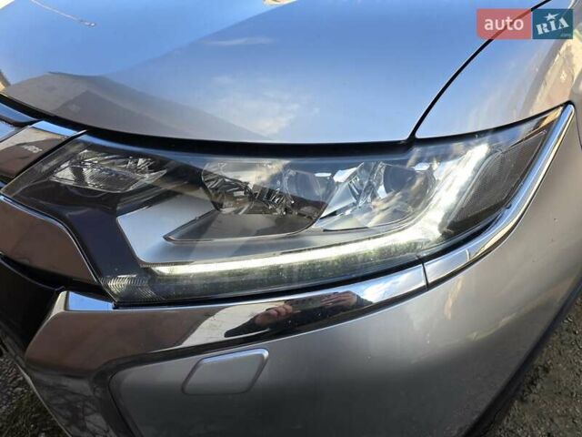 Серый Мицубиси Аутлендер, объемом двигателя 2.36 л и пробегом 164 тыс. км за 17500 $, фото 9 на Automoto.ua