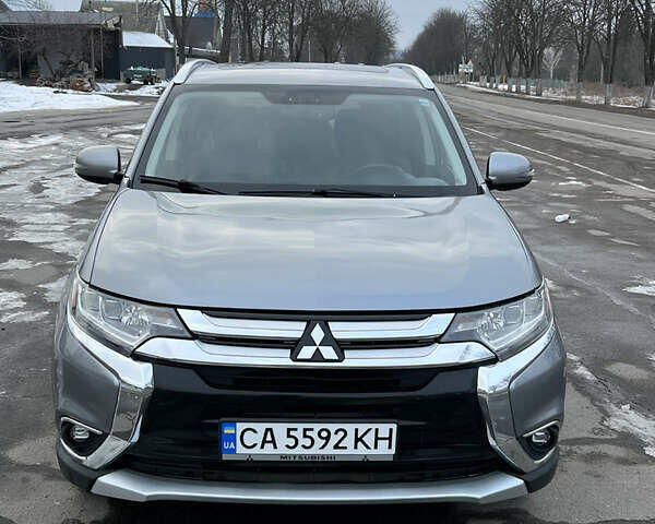 Сірий Міцубісі Аутлендер, об'ємом двигуна 3 л та пробігом 175 тис. км за 14300 $, фото 1 на Automoto.ua