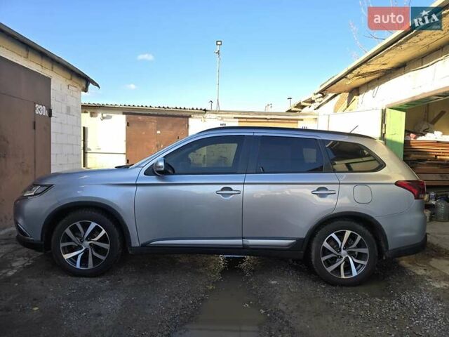 Серый Мицубиси Аутлендер, объемом двигателя 2.36 л и пробегом 164 тыс. км за 17500 $, фото 2 на Automoto.ua
