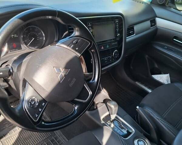 Серый Мицубиси Аутлендер, объемом двигателя 2.4 л и пробегом 160 тыс. км за 14200 $, фото 4 на Automoto.ua