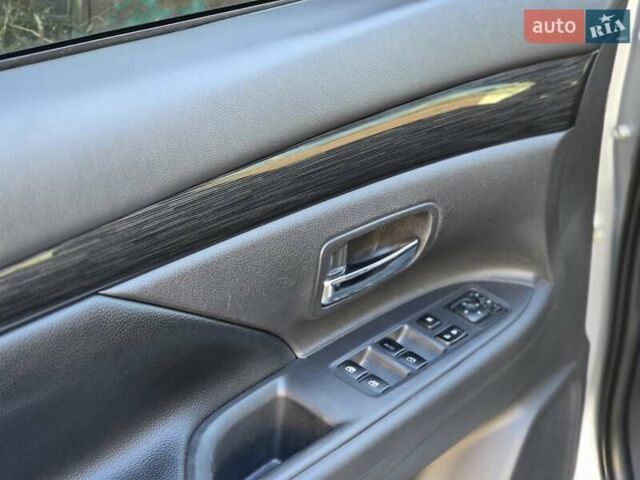 Серый Мицубиси Аутлендер, объемом двигателя 2.36 л и пробегом 164 тыс. км за 17500 $, фото 18 на Automoto.ua