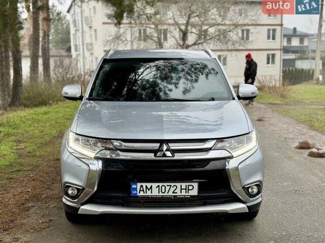 Серый Мицубиси Аутлендер, объемом двигателя 2.2 л и пробегом 180 тыс. км за 16499 $, фото 1 на Automoto.ua