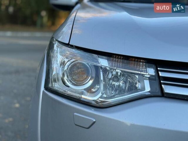 Серый Мицубиси Аутлендер, объемом двигателя 2 л и пробегом 200 тыс. км за 13999 $, фото 16 на Automoto.ua