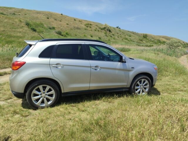 Серый Мицубиси Аутлендер, объемом двигателя 2.4 л и пробегом 132 тыс. км за 12300 $, фото 4 на Automoto.ua