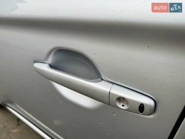 Серый Мицубиси Аутлендер, объемом двигателя 2.2 л и пробегом 180 тыс. км за 16499 $, фото 13 на Automoto.ua