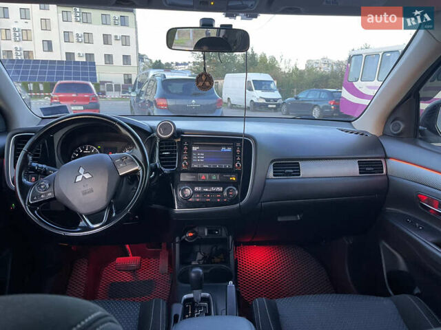 Серый Мицубиси Аутлендер, объемом двигателя 2.36 л и пробегом 140 тыс. км за 14900 $, фото 10 на Automoto.ua