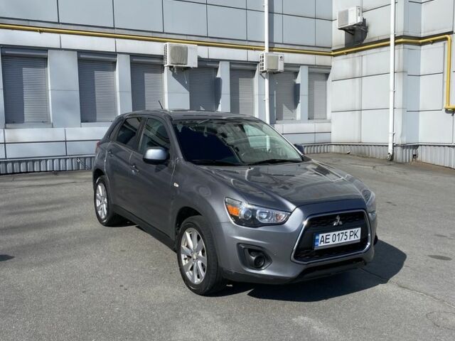 Серый Мицубиси Аутлендер, объемом двигателя 2.4 л и пробегом 250 тыс. км за 10800 $, фото 1 на Automoto.ua