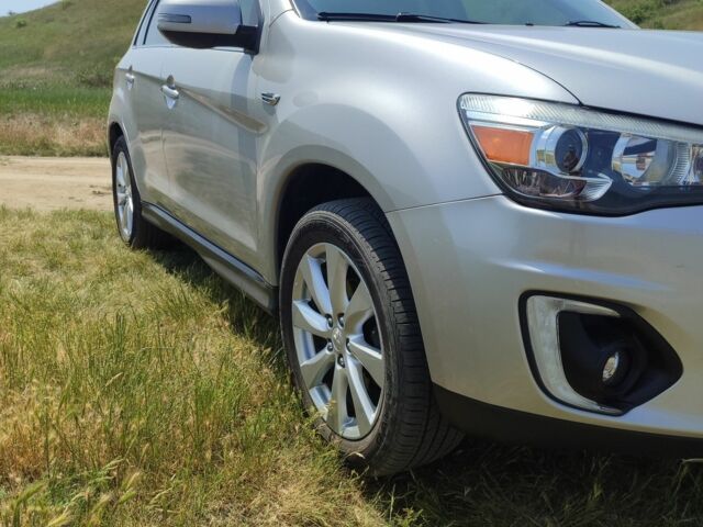 Серый Мицубиси Аутлендер, объемом двигателя 2.4 л и пробегом 132 тыс. км за 12300 $, фото 1 на Automoto.ua