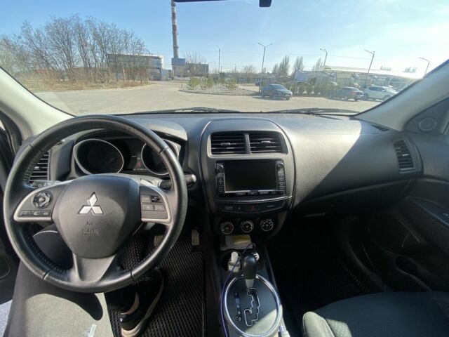 Серый Мицубиси Аутлендер, объемом двигателя 2.4 л и пробегом 250 тыс. км за 10800 $, фото 6 на Automoto.ua
