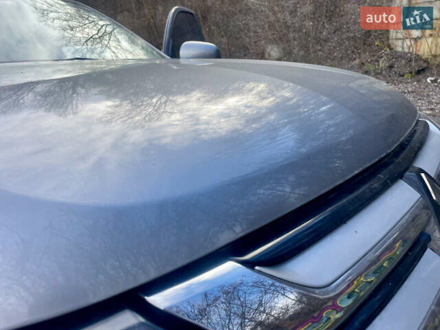 Серый Мицубиси Аутлендер, объемом двигателя 2.4 л и пробегом 213 тыс. км за 13999 $, фото 60 на Automoto.ua