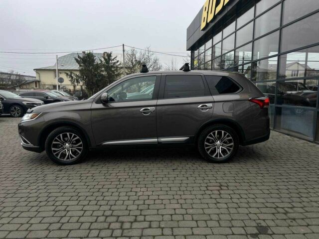 Серый Мицубиси Аутлендер, объемом двигателя 2.4 л и пробегом 160 тыс. км за 14900 $, фото 3 на Automoto.ua