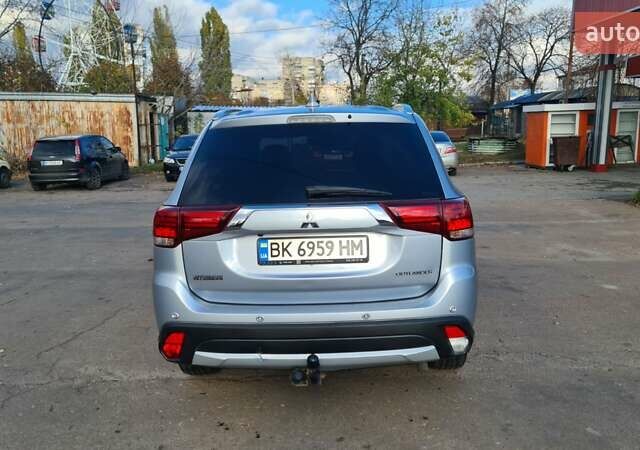 Серый Мицубиси Аутлендер, объемом двигателя 2.3 л и пробегом 253 тыс. км за 18500 $, фото 8 на Automoto.ua