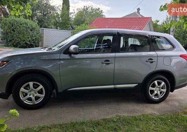 Серый Мицубиси Аутлендер, объемом двигателя 2 л и пробегом 44 тыс. км за 17900 $, фото 4 на Automoto.ua