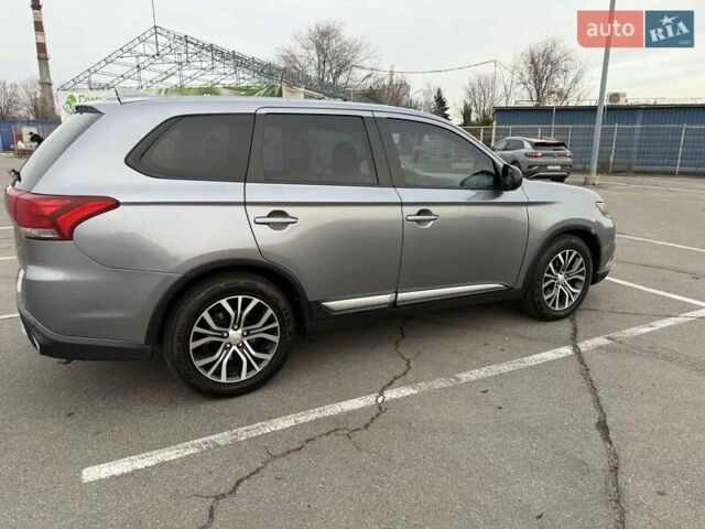 Сірий Міцубісі Аутлендер, об'ємом двигуна 2.36 л та пробігом 147 тис. км за 13200 $, фото 2 на Automoto.ua