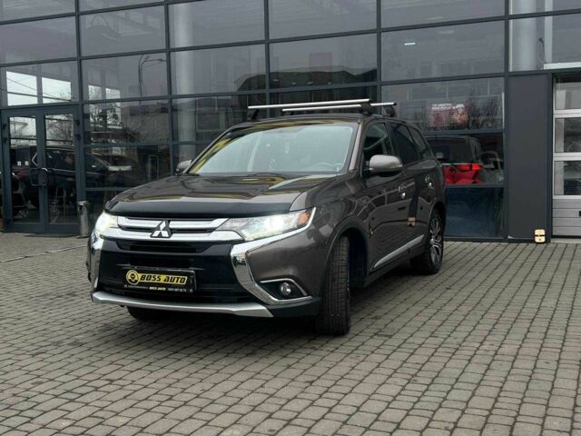 Серый Мицубиси Аутлендер, объемом двигателя 2.4 л и пробегом 160 тыс. км за 14900 $, фото 2 на Automoto.ua
