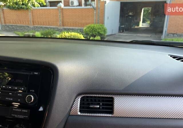 Серый Мицубиси Аутлендер, объемом двигателя 2 л и пробегом 44 тыс. км за 17900 $, фото 47 на Automoto.ua