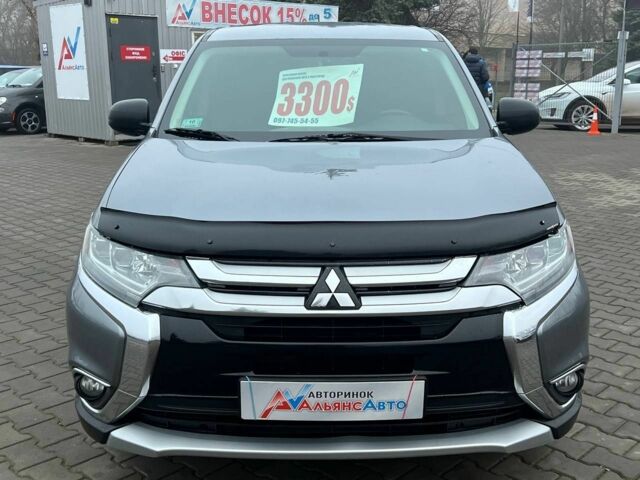 Серый Мицубиси Аутлендер, объемом двигателя 2.4 л и пробегом 205 тыс. км за 13400 $, фото 1 на Automoto.ua